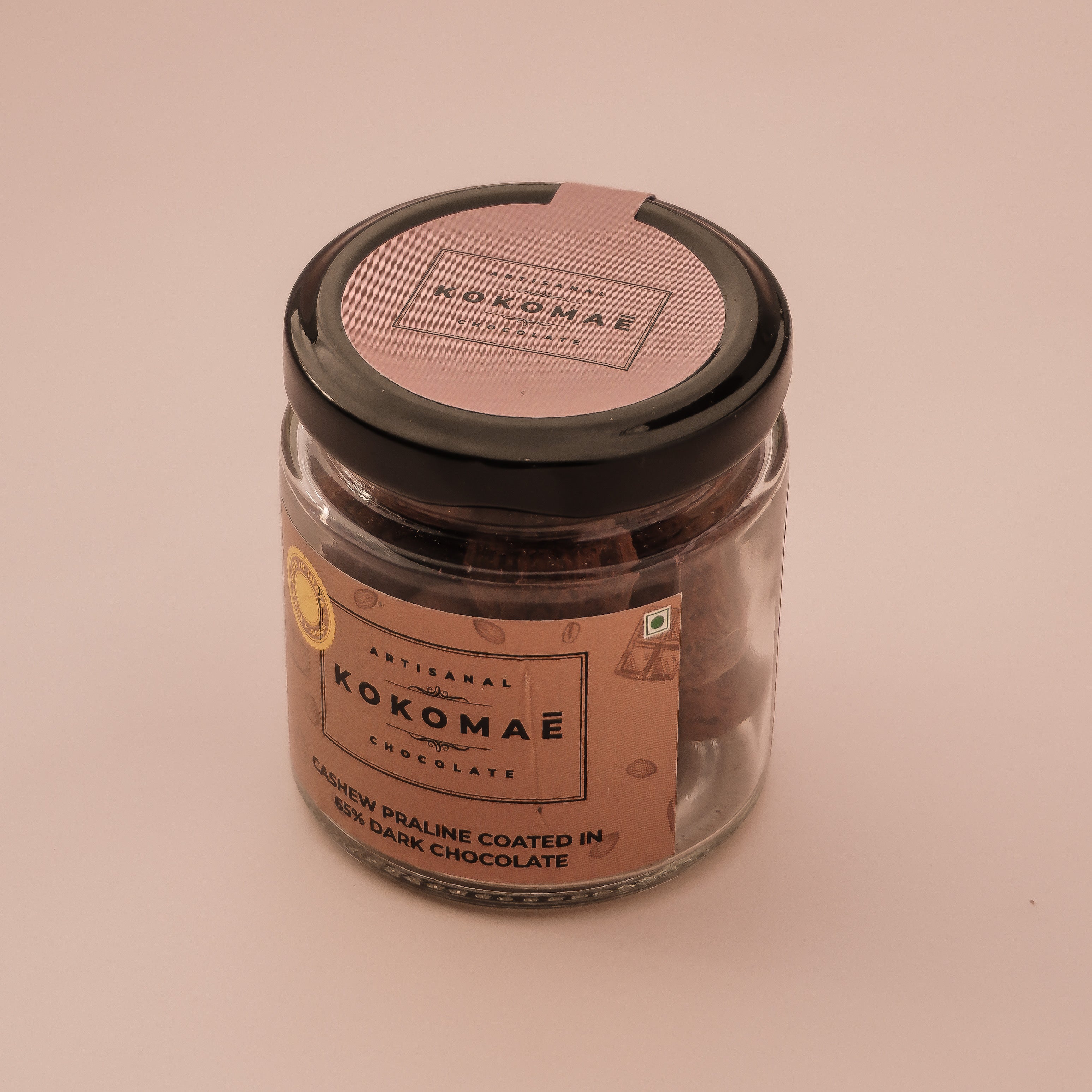 Kokomaē Cashew Praline Dragees lusiously coated in 65% Dark Chocolate
