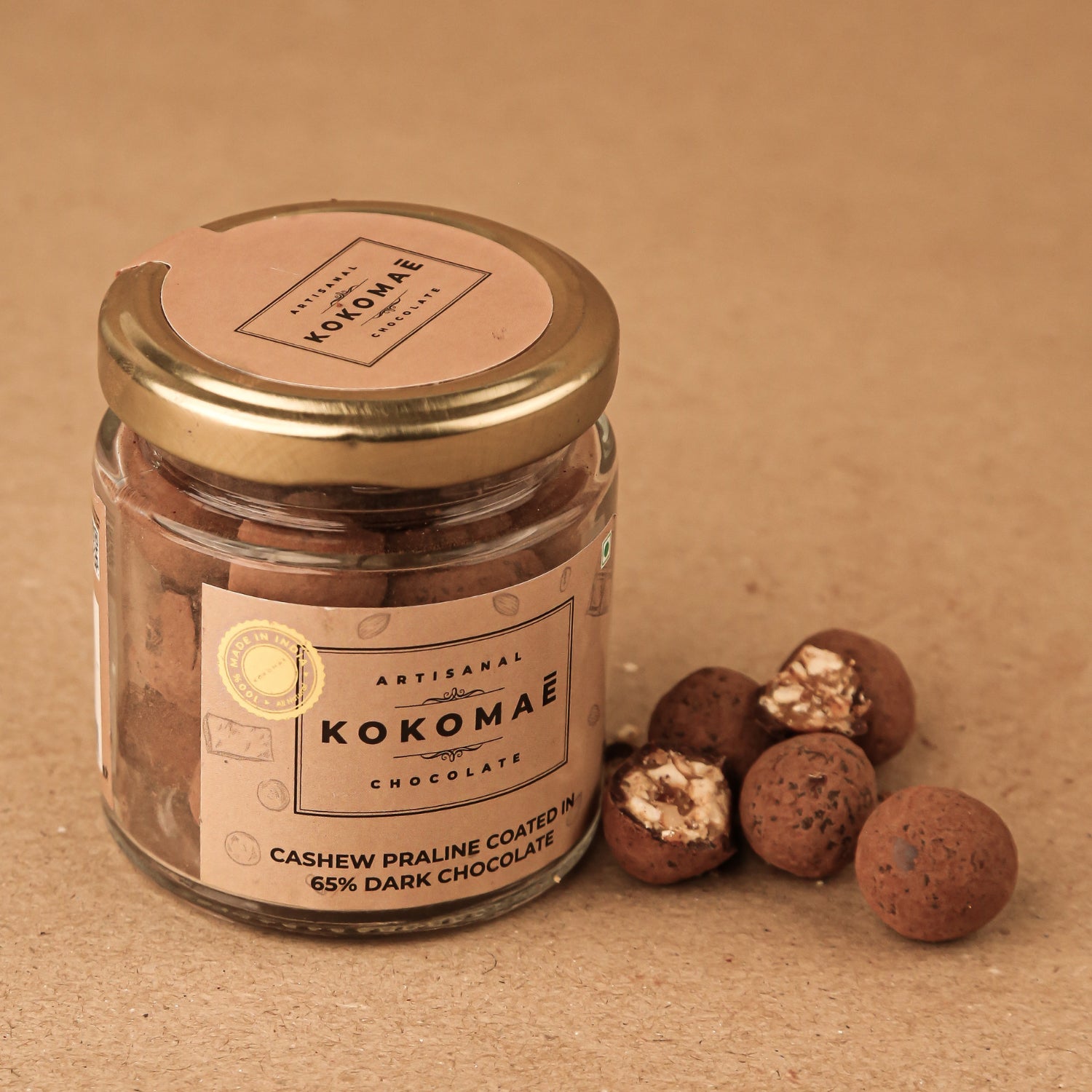 Kokomaē Cashew Praline Dragees lusiously coated in 65% Dark Chocolate